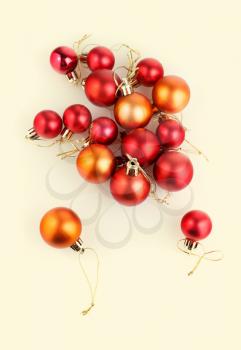 Bright red and orange christmas balls. Vertical composition.