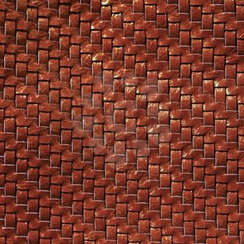 Brown braided leather texture. Leather background. Front view.