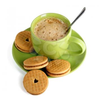 Green cup of coffee with biscuits. Isolated on white.