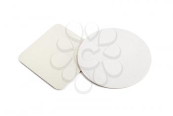 Blank cardboard coasters for beer on a white background. Round and square. Isolated with clipping path.
