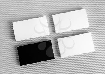 Blank business cards on gray background.. Template for ID. Several business cards. Mock-up for branding identity. Top view.