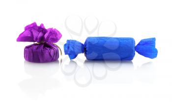 Blue and purple gift boxes with reflection on a white background. Isolated with clipping path.