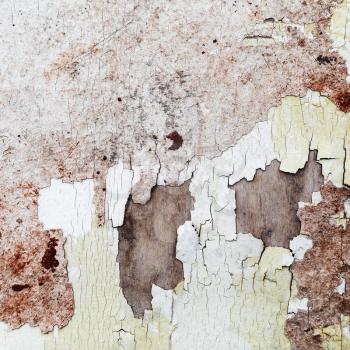 Peeling paint texture. Fragment of the old grunge wall, cracked over time. 