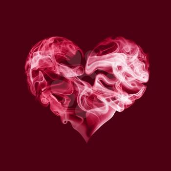 Abstract red heart from smoke on red background