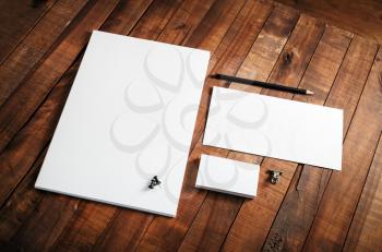 Blank stationery template. Blank stationery set on wooden table background. ID template. Mock-up for branding identity for designers.