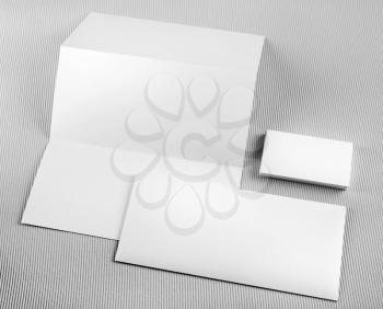 Photo of blank stationery set on gray background. Template for design presentations and portfolios. Mock-up for branding identity. Template for ID.