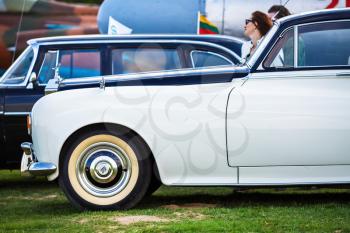MINSK, BELARUS - MAY 07, 2016: Close-up photo of retro Rolls Royce. Classic vintage cars side view. Selective focus.