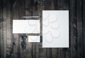Photo of blank corporate identity. Blank stationery set. Branding mockup. Sheet of paper, letterhead, business cards, envelope and pen. Top view.