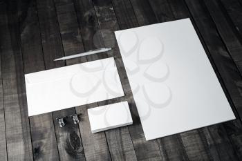 Branding template on wooden table background. Blank stationery. Mockup for branding identity for placing your design.