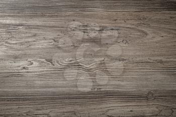 Brown wood texture with natural pattern for placing your design. Wooden background.