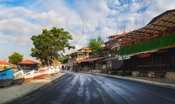 Nesebar, Bulgaria - September 05, 2014: Asphalted road in the old town of Nesebar, Bulgaria. Nessebar is an ancient town on the Bulgarian Black Sea Coast. Architecture and pavement in Historic Complex