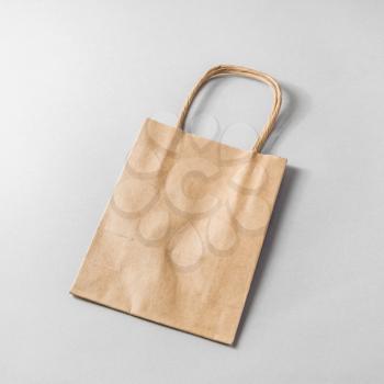 Photo of paper shopping bag. Craft paper package.