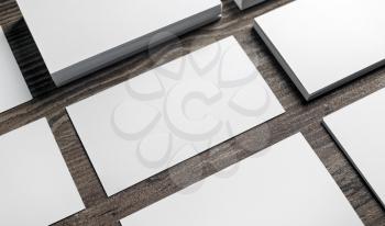 Photo of blank white business cards. Template for placing your design. Responsive design mockup with plenty of copy space.