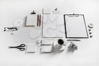 Photo of blank stationery set on paper background. Corporate identity mock up for placing your design. Top view.