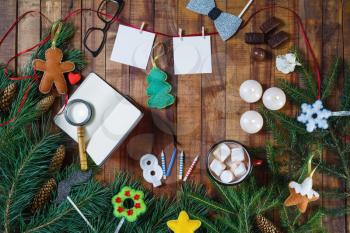 Christmas holidays composition on wooden background. Festive still life. Flat lay.