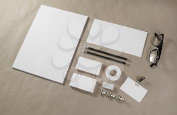Brand identity mockup. Blank corporate stationery set on craft paper background.