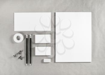 Blank white stationery mock-up. Template for branding identity on craft paper background. For graphic designers presentations and portfolios. Top view.
