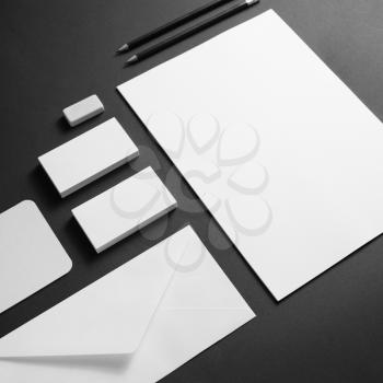 Corporate identity template. Blank stationery set on black paper background. For graphic designers presentations and portfolios.
