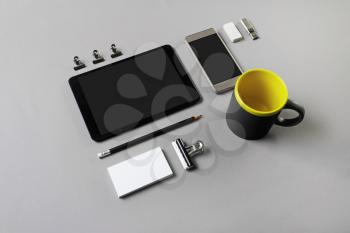 Still life with gadgets. Brand identity template. Photo of blank stationery on gray paper background.