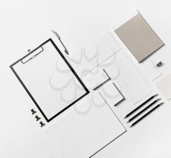 Blank stationery set on paper background. Corporate identity mock up. Top view. Flat lay.