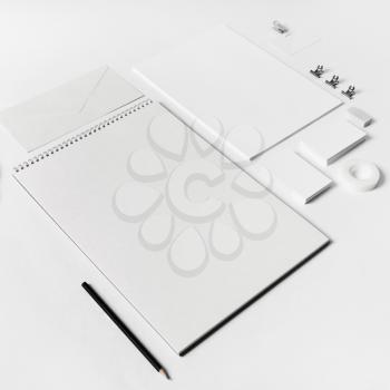 Photo of blank stationery set on white paper background.