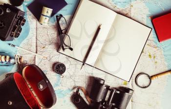 Outfit of traveler and vacation items. Overhead view of travel accessories. Vintage toned image. Top view. Flat lay.