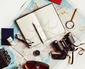 Objects for tourism and travel. Trip or vacation items. Vintage toned image. Top view. Flat lay.