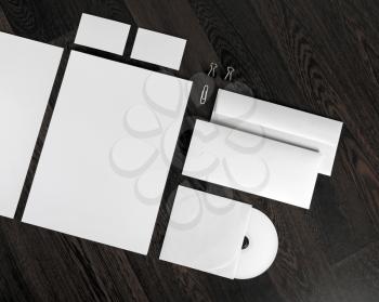 Branding identity template. Photo of blank stationery set on wood table background. Objects for placing your design.