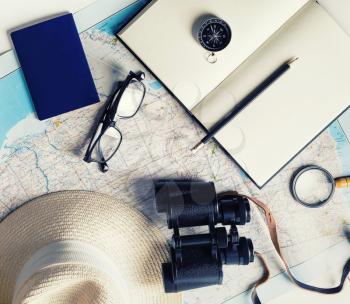 Essential travel accessories. Traveler items. Vacation concept. Vintage toned image. Flat lay