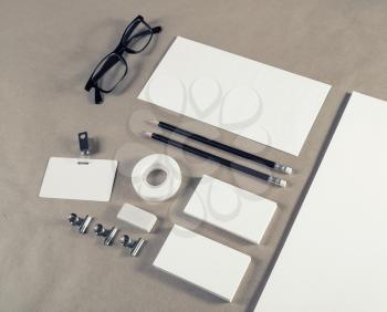 Photo of blank stationery template on craft paper background. Corporate identity mockup.
