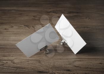 Blank business cards on wood background. For promotion of corporate identity.