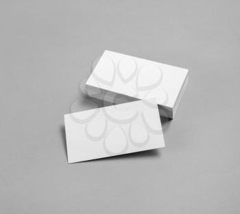 Blank business cards on gray paper background. Template for placing your design.