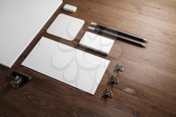 Blank stationery set on wooden background. Corporate identity template. Responsive design mockup.