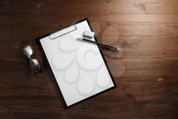 Blank simple stationery mock-up on wood table background. Branding template. Flat lay.