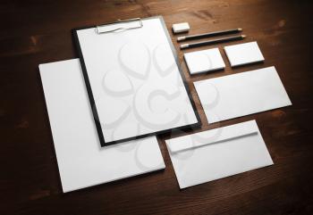 Blank corporate stationery on wooden background. Template for branding identity.