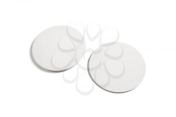 Two blank beer coasters isolated on white background. Clipping path.
