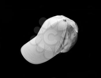 White baseball cap on black background. Template for placing your design.