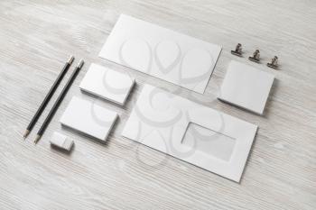 Blank corporate identity. Stationery template on light wood table background. Branding mockup.