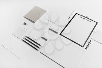 Photo of blank stationery set. Corporate identity template on white paper background. Mock up for placing your design. Responsive design mockup.