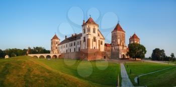 Medieval castle in Mir, Belarus. Ancient castle with towers, acute-angled roof. UNESCO World Heritage. Panoramic shot.