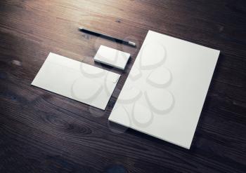 Photo of blank corporate identity. Stationery set. Branding mockup. Letterhead, business cards, envelope and pencil.