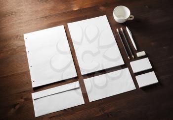 Corporate stationery mockup on wood table background. Branding mock up for designers portfolios.