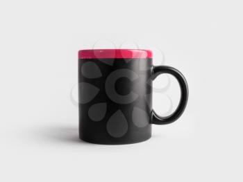 Blank black and red mug for coffee or tea. Cup mock-up. Responsive design mockup.