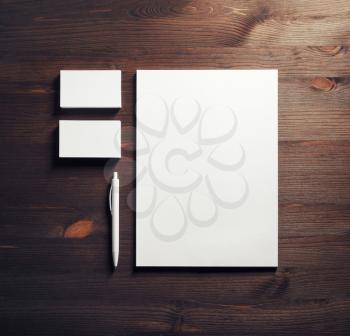 Top view of blank white stationery set on wooden background. Business brand template. Flat lay.
