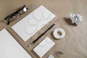 Template for branding identity. Blank stationery set on craft paper background. Objects for placing your design.