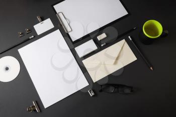 Blank stationery template for placing your design. Mockup for branding identity on black paper background.