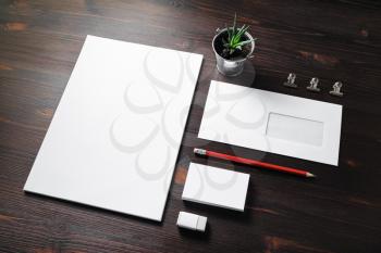 Blank stationery set on wood table background. Corporate identity template. Mock-up for branding identity for designers.