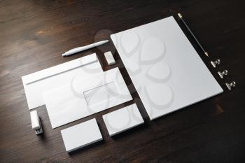 Blank branding stationery set on wood table background. Corporate stationery template.