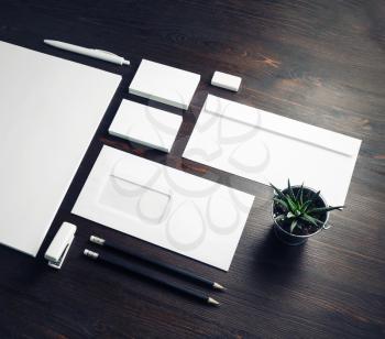 Blank stationery set on wooden background. Corporate identity template. Responsive design mockup.