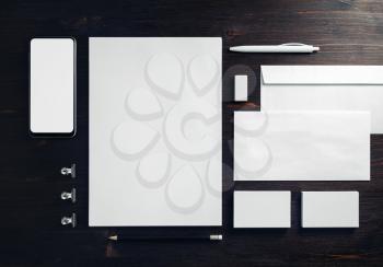 Corporate identity template. Photo of blank stationery set on wooden background. Mockup for design presentations and portfolios. Flat lay.
